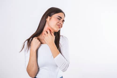 Young,Woman,Suffering,From,Itching,On,Her,Skin,And,Scratching